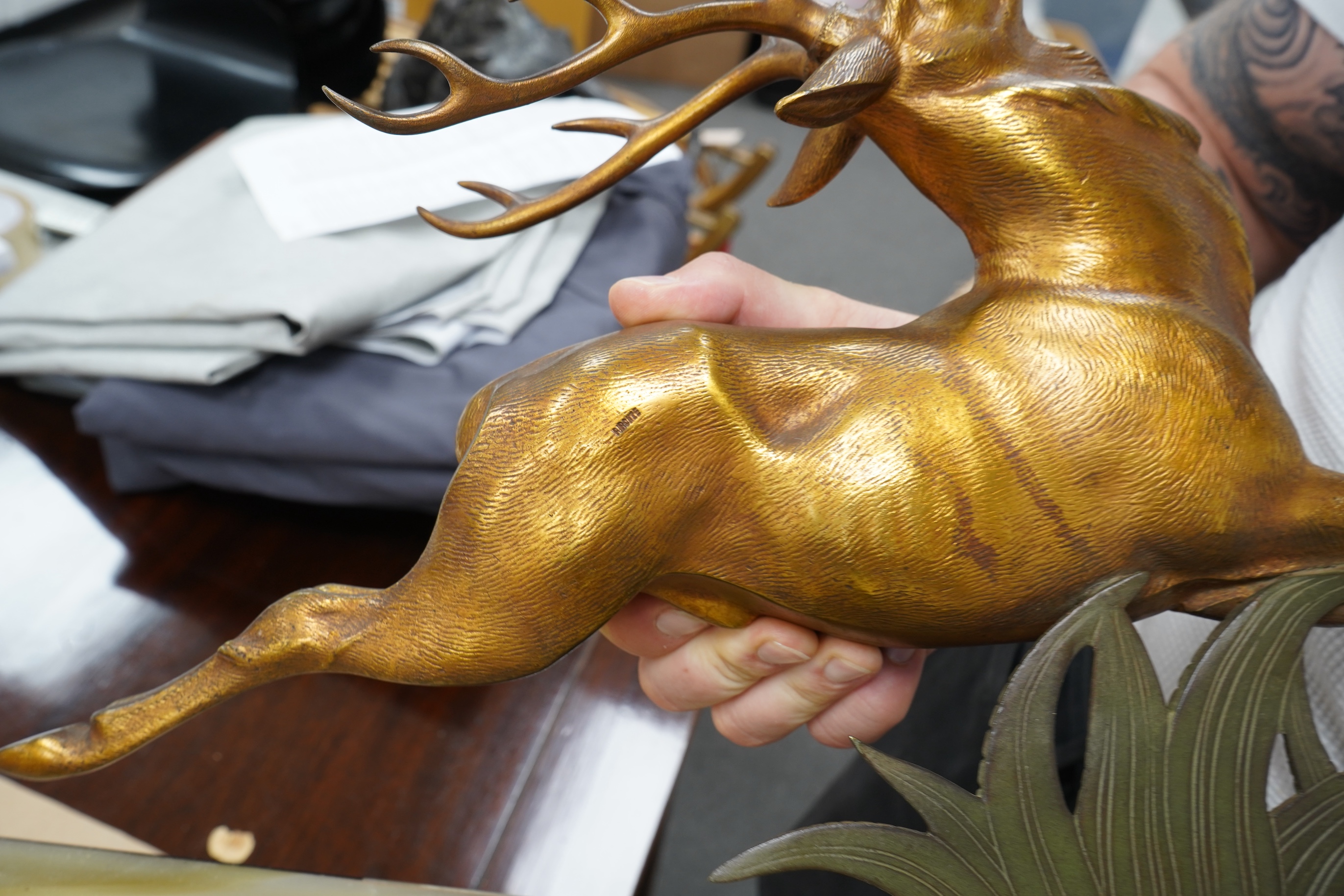 A French Bronze stag attributed to E Guy, on onyx base, 53cm wide x 33cm high